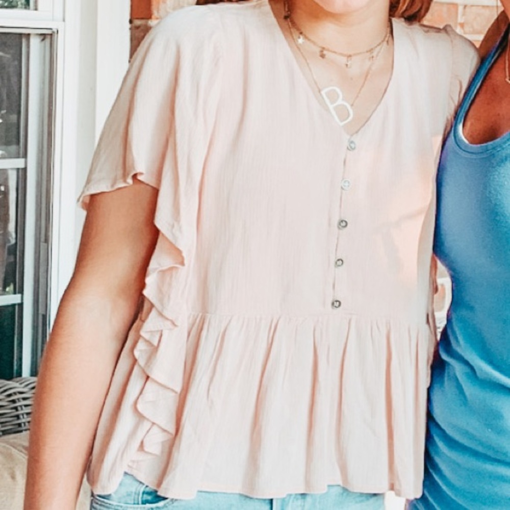 Love, Fire Apparel Flutter Peplum Top.